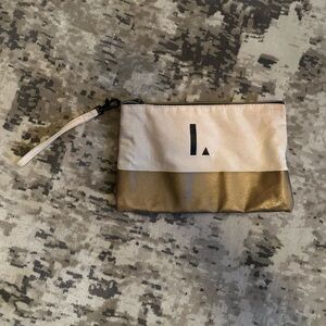 L monogrammed clutch